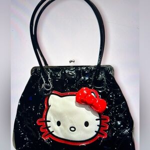 Y2K vintage hello Kitty SANRIO embossed Patton, leather handbag.
